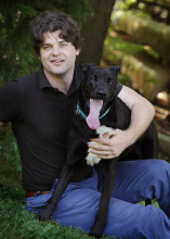 Dr. Brian Hare with his shelter rescue clever canine, Tassie.