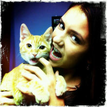 Ian's girlfriend and co-star, Nina Dobrev, and his cat.