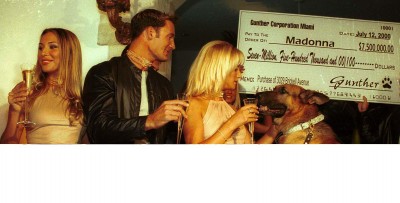 Gunther with cheque for Madonna's Miami home