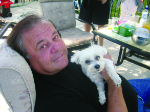 Goodfella's Paul Sorvino and Lucky relax on the patio