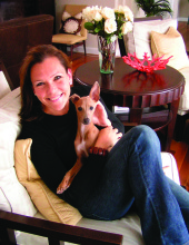 Designer Jennifer Fenton and her well-dressed pup Mitzie.