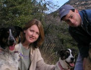 Betsy and Jared Saul, and two of their dogs