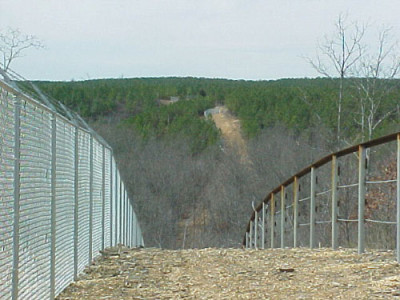 200-acre steel pipe and cable elephant corral  and a 222-acre perimeter "people" fence