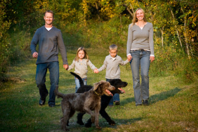 family-walk-with-dogs