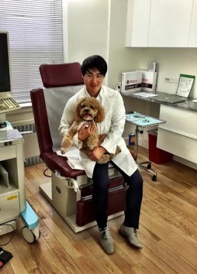 Dr. Chen taking care of his favorite patient!